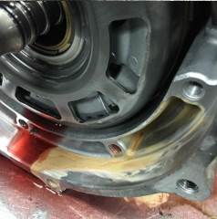 When radiator leaks antifreeze into transmission fluid, it turns tan or pink